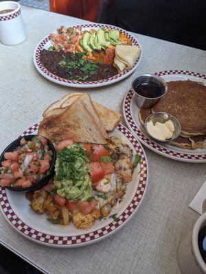 Vegan rancheros, "vegan mess" with vegan cheese, potatoes, tofu, and soyrizo. Also... Vegan pancakes! Other vegan options explicitly labeled. Yum! Best vegan breakfast I've had in  at St Francis Fountain and Candy in San Francisco