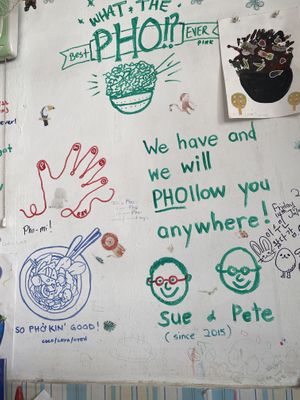 Fun wall next to my seat  at Vietnamese Coffee & Noodle Soup in Siem Reap