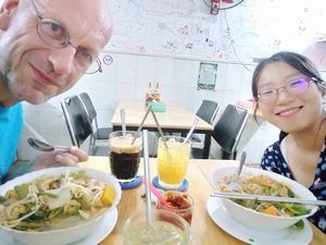 2 happy vegan-pho eaters at Vietnamese Coffee & Noodle Soup in Siem Reap