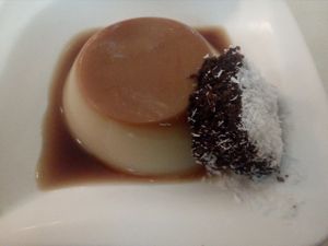 Flan and chocolate coconut cake at Loving Hut in Valencia
