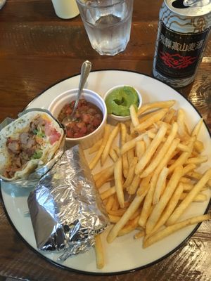 Vegetarian burrito, fries, guacamole, salsa and a beer  at EvilTex in Takayama