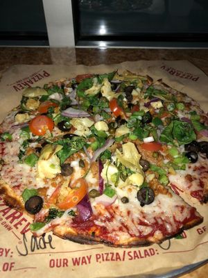 Vegan pizza w/ cheese, sausage, veggies at PizzaRev in Sioux Falls