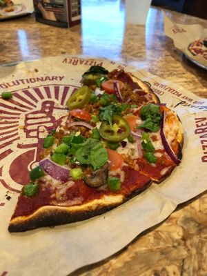 Vegan pizza your pick of toppings!  at PizzaRev in Sioux Falls