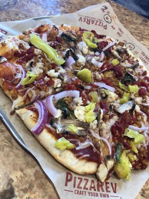 Vegan cheese and sausage  at PizzaRev in Sioux Falls