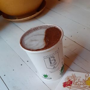 Chichalatte with cacao toping at BEAT Brew Bar in Valencia
