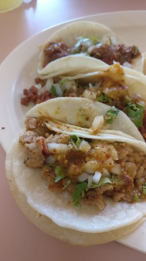 Soy pastor, chicken, and chorizo combo at Lily's Tacos in Santa Ana