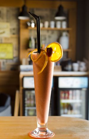 Fresh Smoothie: red fruits, mango, apple and orange juice at Cafe del Far in Salou