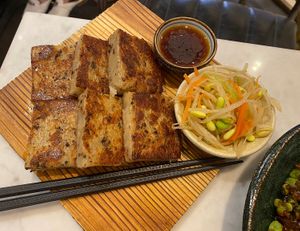 Can’t resist a turnip cake!  at Herbivore - Shin Kong Mitsukoshi in Taipei