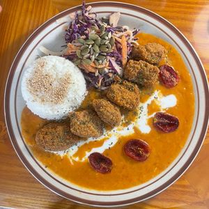 Vegan curry with crispy chicken and rainbow coleslaw   at And 유 (Yu) Cafe in Jeju