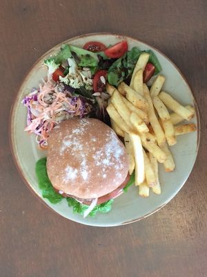 Homemade vegan burger, chips and salad at And 유 (Yu) Cafe in Jeju
