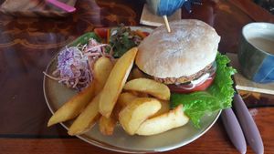 Black Bean burger, potato wedges, salad, and slaw at And 유 (Yu) Cafe in Jeju