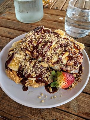 Peanut butter chocolate banana toast (ve) 😍 at Charlie's Raw Squeeze in Morningside