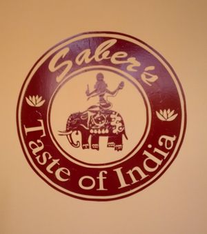 saber logo at Saber's Taste of India in Kingston