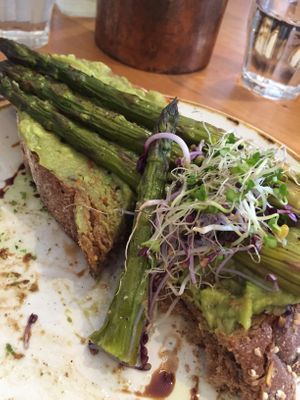 Simple but delicious. Classic - Avo on toast with asparagus.  at That's Toast in Bruges