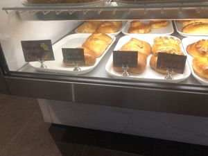 Vegan Piroshkis: beef & cheese, tofu sisig, potato, Seattle dog  at Pinoyshki in Seattle