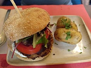 Daily menu / main course / cajun burger at La Tia Carlota in Madrid
