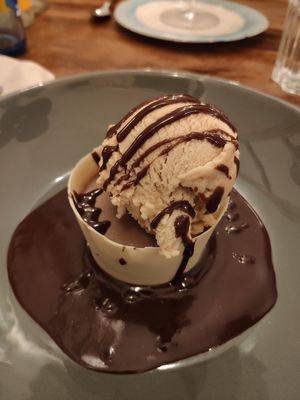Chocolate and Caramel Ice Desert in a Chocolate Cup at La Tia Carlota in Madrid