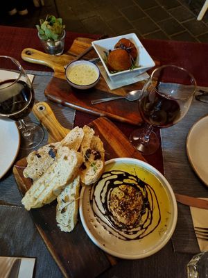 Arancini balls and artisan bread with oil and balsamic reduction at Francesco's Osteria in Torrensville