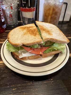 Tomato, alfalfa, avocado, lettuce, cucumber sandwich on wheat bread   at Center 4 Hamburgers in Takayama
