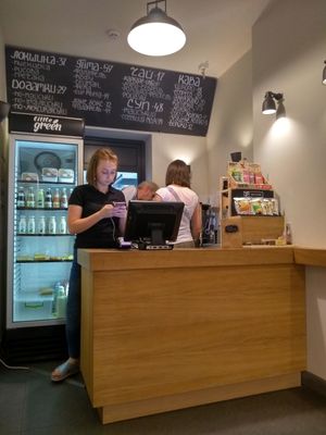 Menu on a wall at Little Green in Lviv