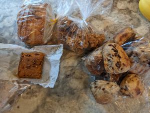 Sweet potato bars, garlic bread, granola, and train rolls/raisin yeast buns at BreadHaus in Grapevine