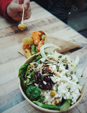 salad bowl and vegetable fries from Padron at Foodhallen in Amsterdam