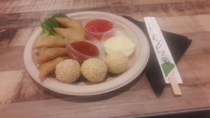 Fried Curry Vegetable and sweet sesame balls at Foodhallen in Amsterdam