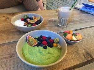 “Green coconut bowl”, “CT’s granola”, Ice Coffee(vegan: possibilty of coconut or oat milk) at CT Coffee & Coconuts in Amsterdam