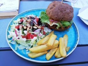 Gluten free burger, salad and chips at Veganeeta Home in Balatonalmadi