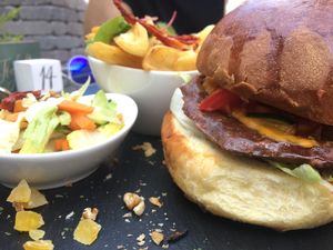 Veggie burger w/ fries   at Veganeeta Home in Balatonalmadi