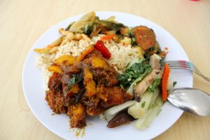 Sweet potatoes and bell pepper, brown rice, mock fish in sweet and sour sauce with raw minced vegetables, sautéed pak choi, mushrooms and carrots with tofu, sautéed veggies. at Tze Ern Vege Restaurant 慈恩素食 in Kuala Lumpur