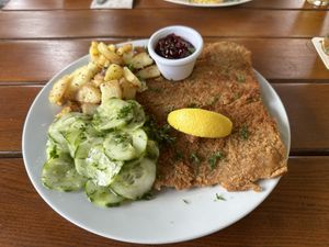 Schnitzel mit Gurkensalat, Preiselbeeren & Bratkartoffeln  at Gasthof Falkenhorst in Burig