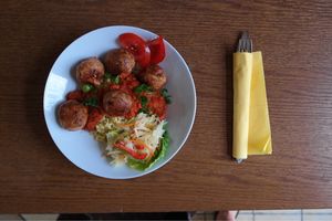 Gemüse Bällchen mit couscous und Tomaten Soße  at Gasthof Falkenhorst in Burig
