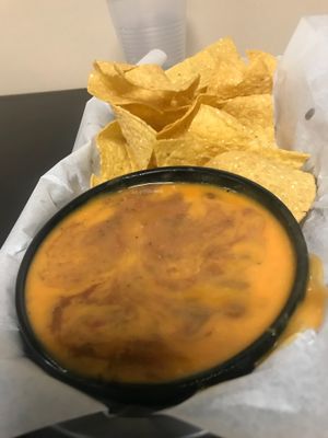 Vegan Chips & Dip - A mixture of vegan cheese, beans & salsa   at Desert Island Eatery in Tucson