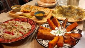 Caviar d'aubergine, boreka, sweet potato with tahini, za'atar bread at Levantine in Paris