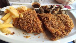 Cachopo de seitán lleno de pisto, queso vegano y cebolla caramelizada. at La Cachopería in Aviles