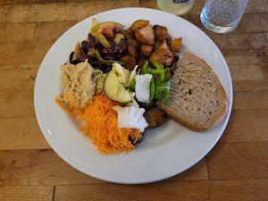 Salad and fried potatoes at Restaurang Solrosen in Gothenburg