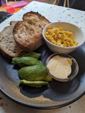 Ago, scrambled tofu and sourdough with vegan butter at Hunter Gatherer in Portsmouth
