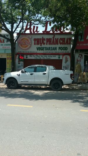 Outdoor sign at Thuc Pham Chay Au Lac in Phu Quoc