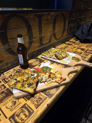 Potato and truffle, tomato and basil, mushroom and vegan cheesee  at Latin Pizza in Bucharest