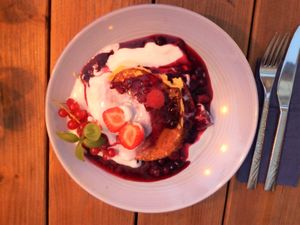 Berry pancakes with coconut yogurt and berry ragout at Vrohstoff in Wurzburg