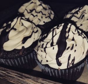 chocolate cupcakes with tahini peanut butter and cream cheese frosting at Moonlight Cafe in Brewster