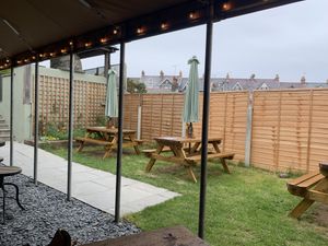 Outside  at Mannings Grocers in Fishguard