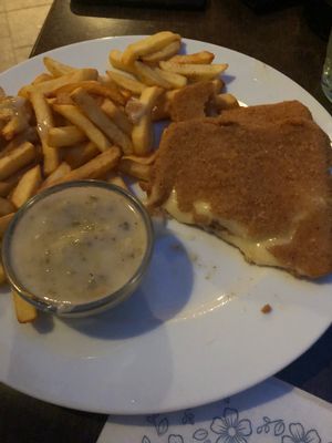 Fried vegan cheese, tartare sauce and fries at Bullizza in Ljubljana