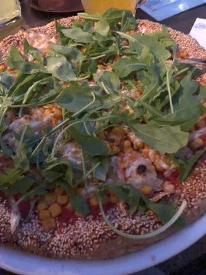 Vegan cheese pizza with sesame crust at Bullizza in Ljubljana
