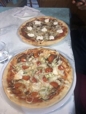 Vegbab pizza and vegan pizza with toppings by choice at Bullizza in Ljubljana