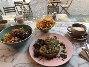 Poke bowl to the left, salt and pepper fries and smashed avocado on toast with soya cappuccinos. All very yummy  at Wild and Wild in Congleton