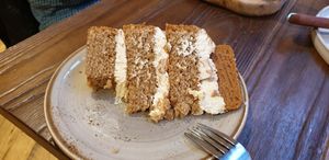 Lotus biscuit triple layer cake with coffee deal. Couldn't wait to try. Lovely and moist. at Wild and Wild in Congleton