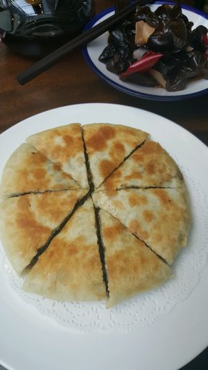 filled pancake (and fungus in the background) at Fanye SuShi in Dali