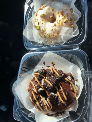 lemon pistachio raised donut and chocolate PB oreo raised donut 😍 👏🏻 at Sweet Retreat Donuts in Long Beach